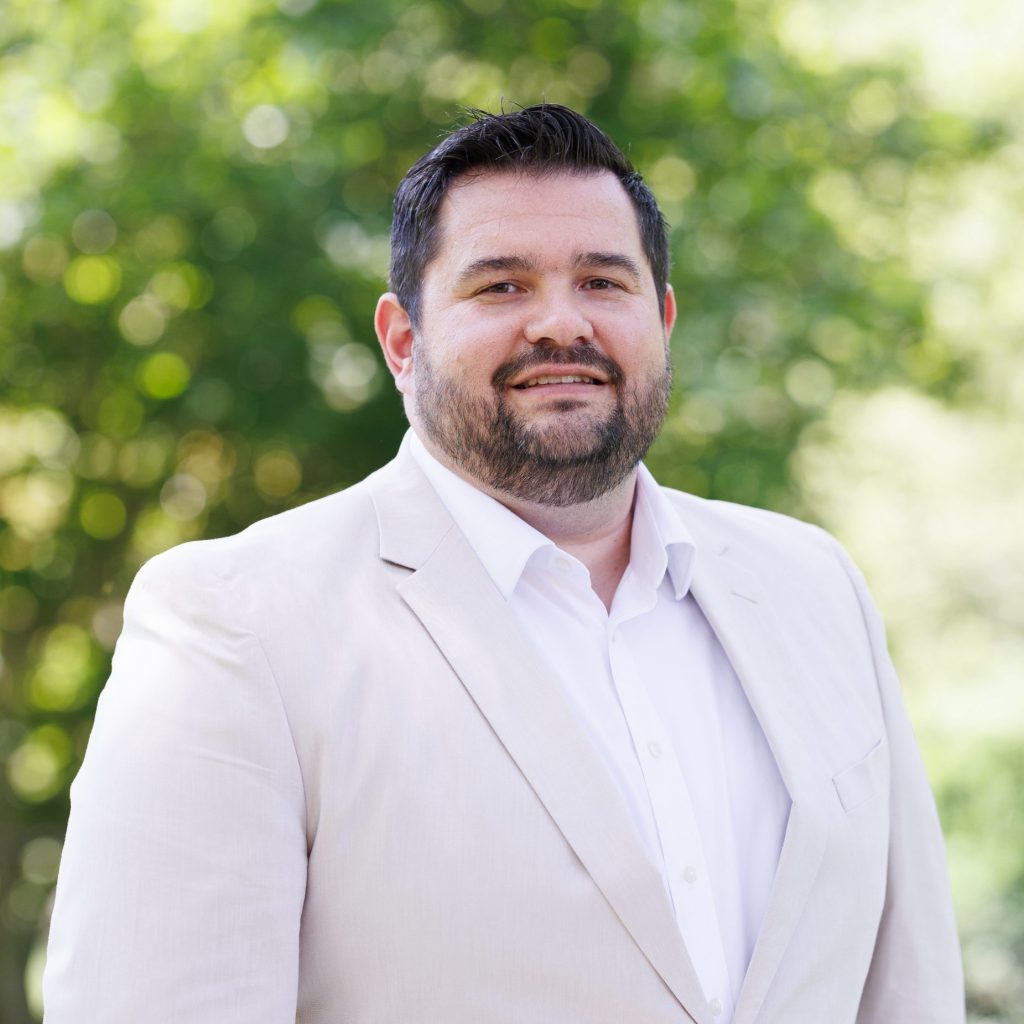 Professional headshot of Chris Smith